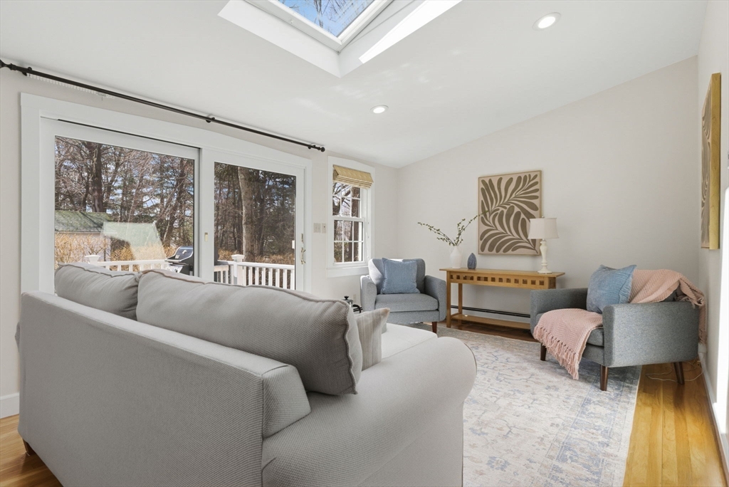 31 Fuller Road Lexington, MA 02420 - Photo 13 of 42 a living room with furniture and a large window