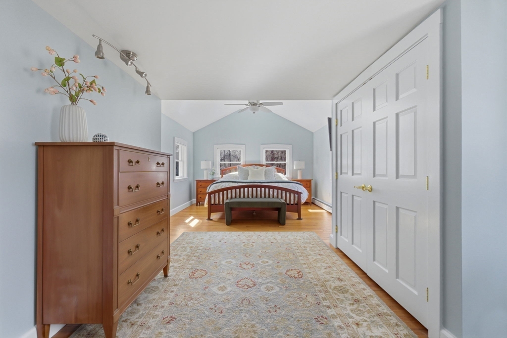 31 Fuller Road Lexington, MA 02420 - Photo 20 of 42 a bedroom with bed and dresser