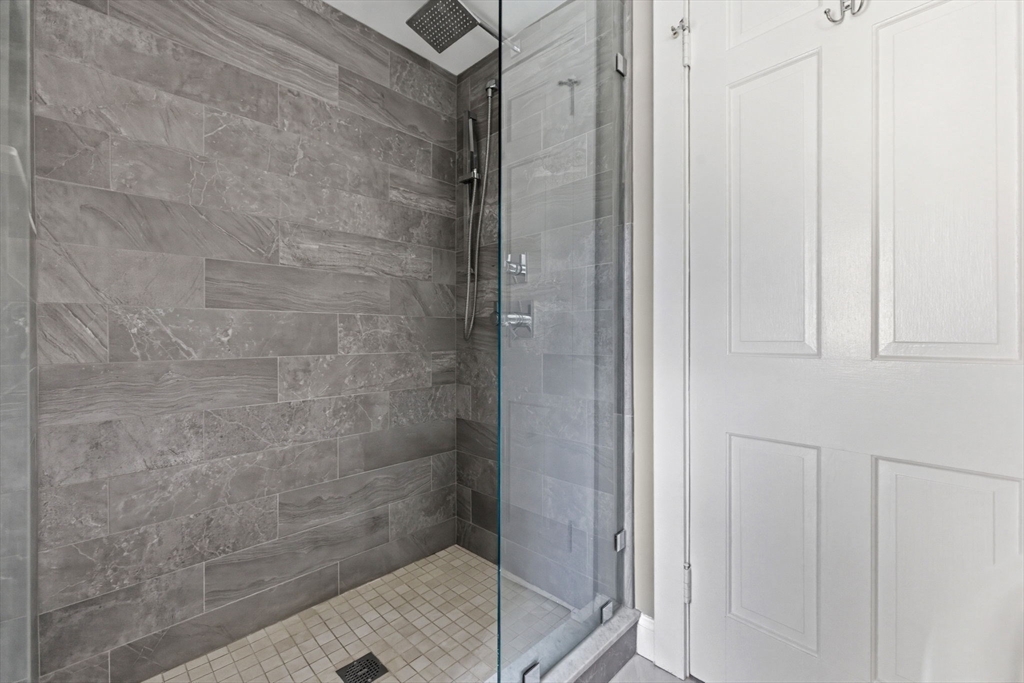 31 Fuller Road Lexington, MA 02420 - Photo 26 of 42 a bathroom with a shower