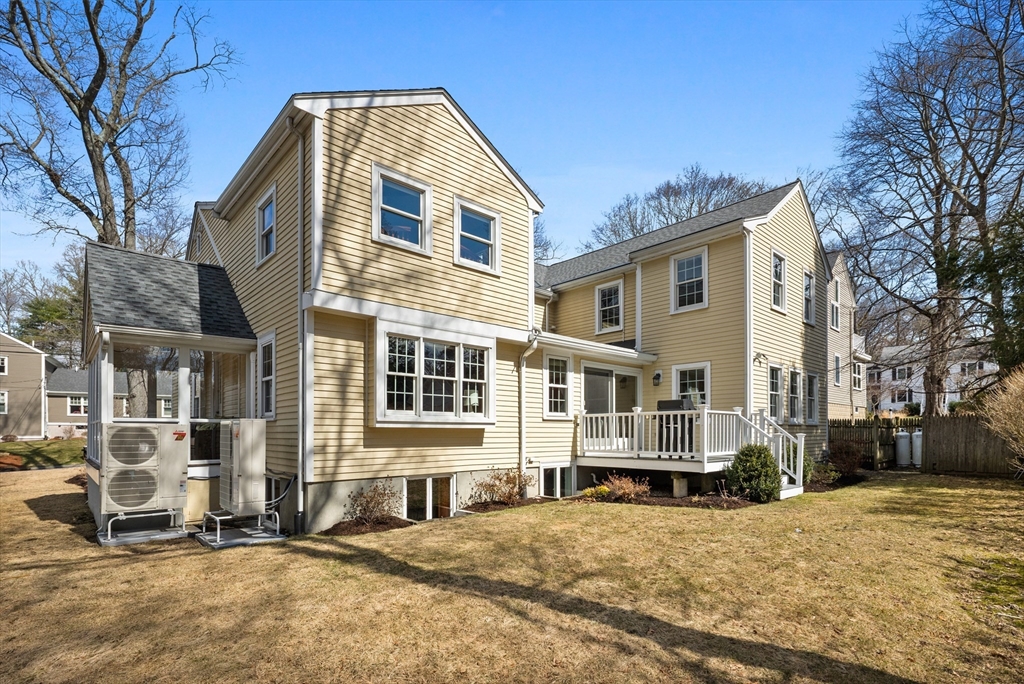 31 Fuller Road Lexington, MA 02420 - Photo 40 of 42 a front view of a house with a yard