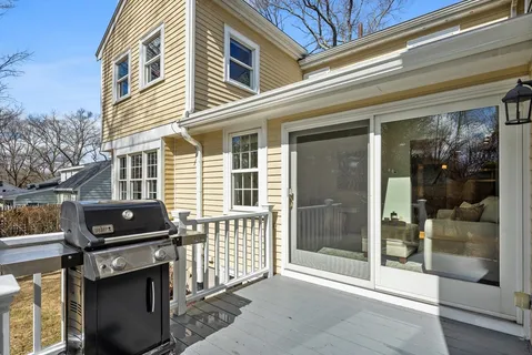 a front view of a house with a glass door