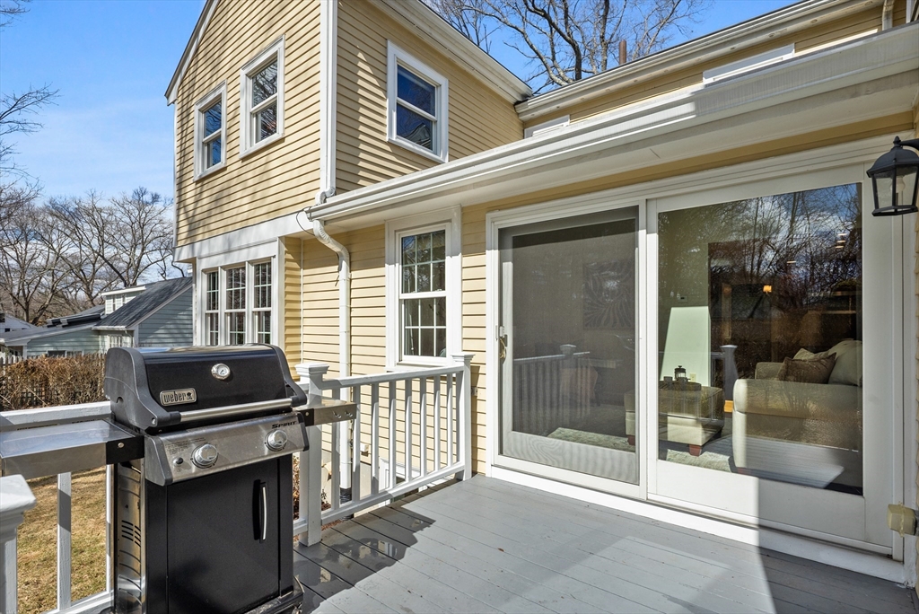 31 Fuller Road Lexington, MA 02420 - Photo 41 of 42 a front view of a house with a glass door
