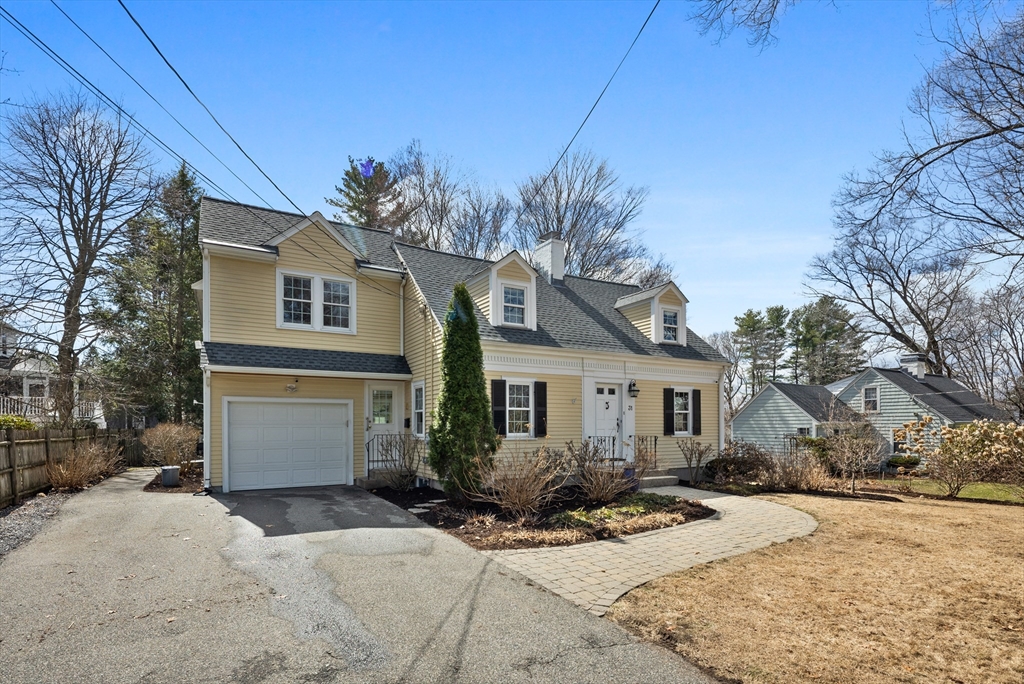 31 Fuller Road Lexington, MA 02420 - Photo 42 of 42 a front view of a house with a yard