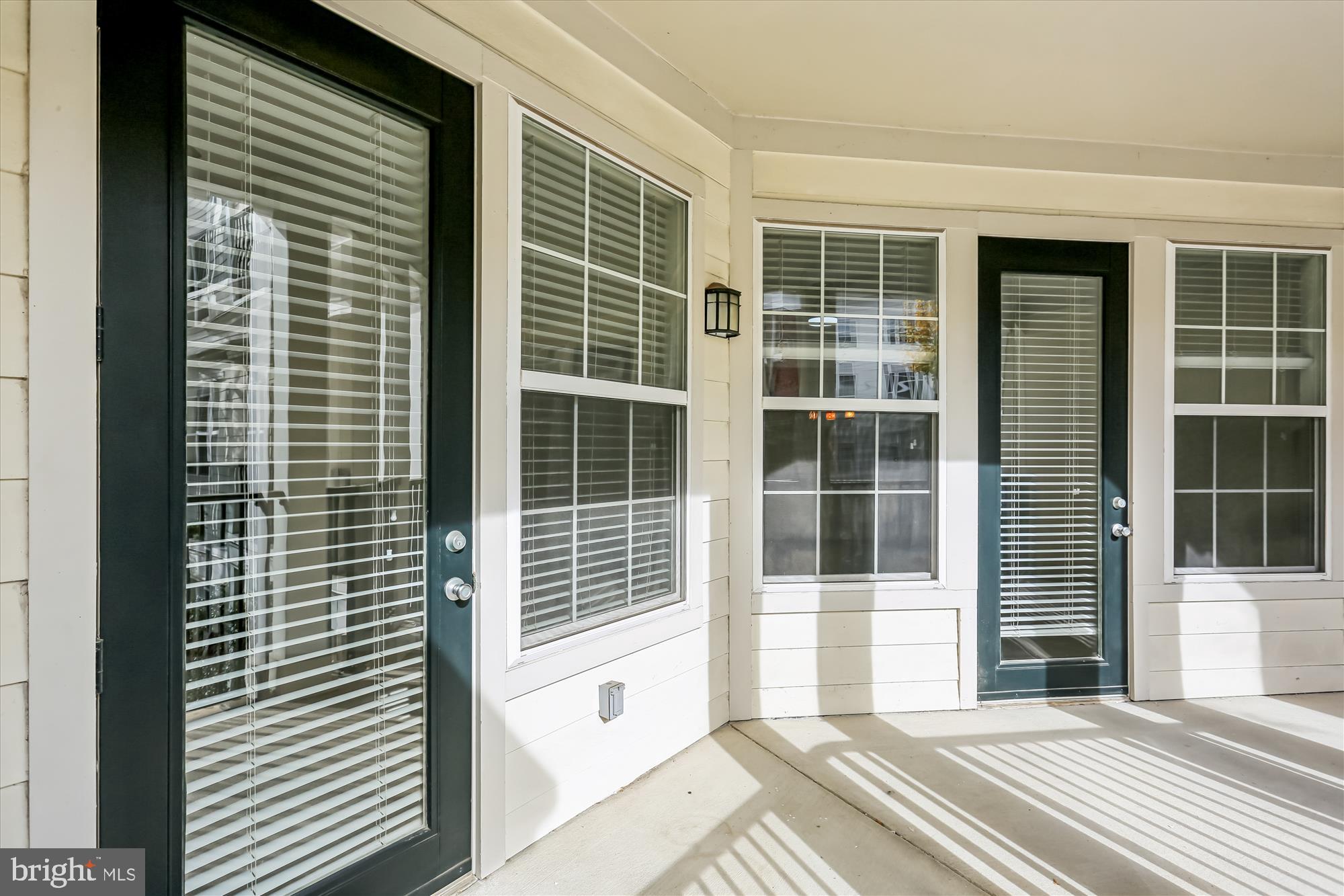 23 Arch Place, Unit 273 Gaithersburg, MD 20878 - Photo 44 of 103 a view of a balcony with a door