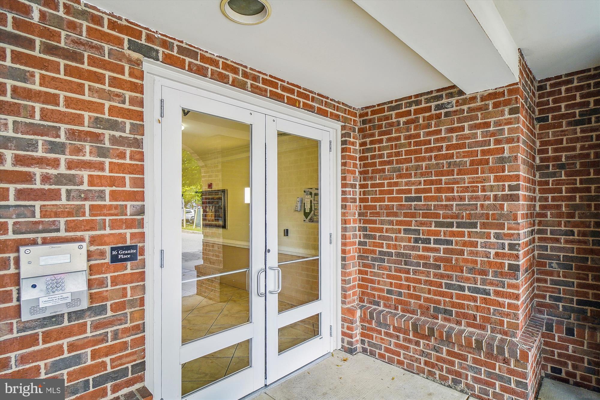 23 Arch Place, Unit 273 Gaithersburg, MD 20878 - Photo 49 of 103 The Colonnade Building Entrance