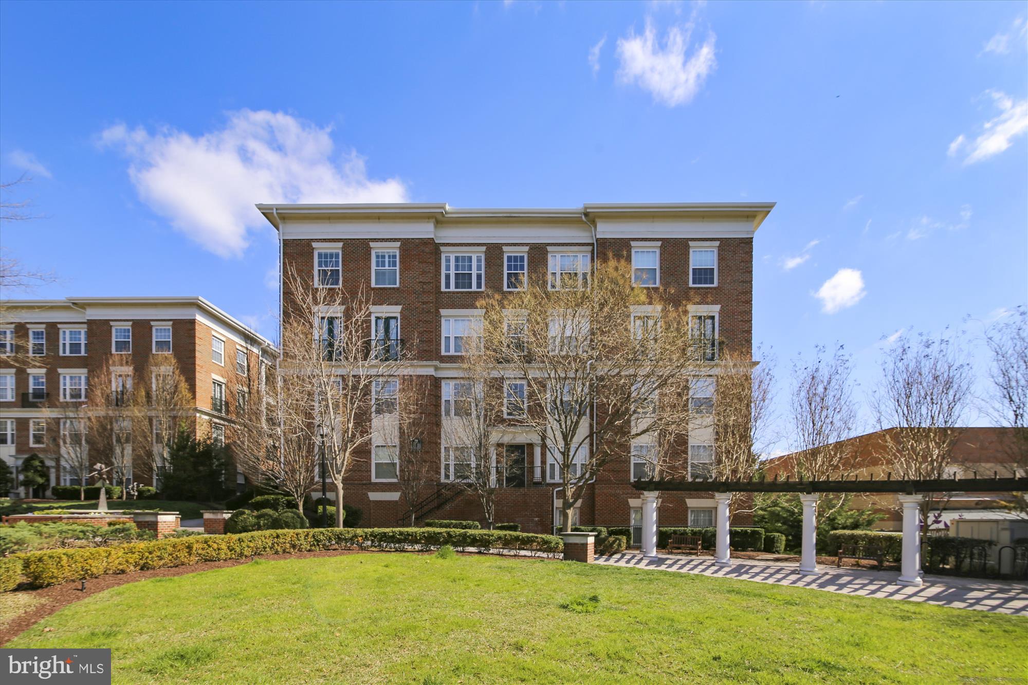 23 Arch Place, Unit 273 Gaithersburg, MD 20878 - Photo 50 of 103 a front view of a house with a yard