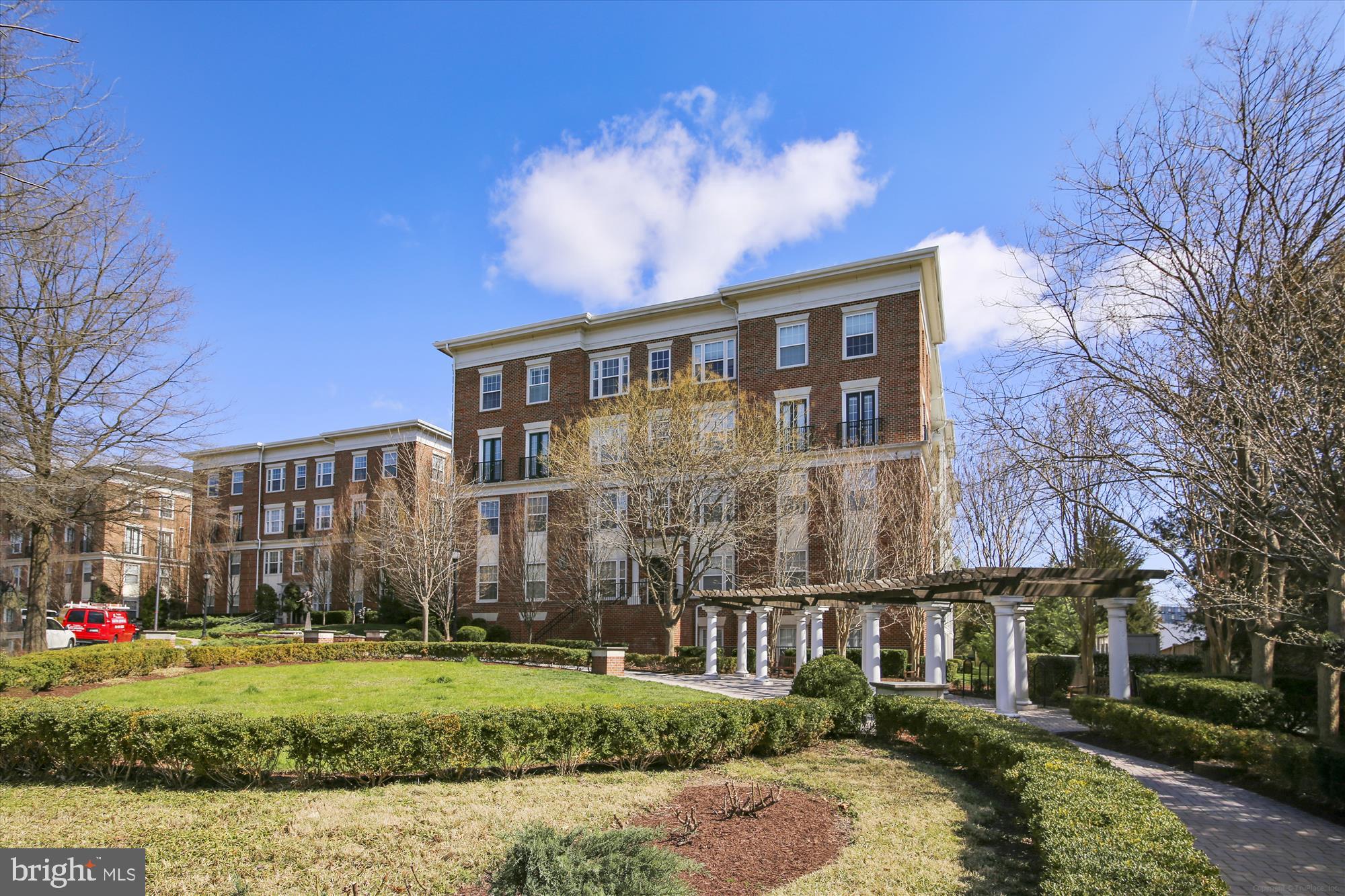 23 Arch Place, Unit 273 Gaithersburg, MD 20878 - Photo 51 of 103 a front view of a house with a yard