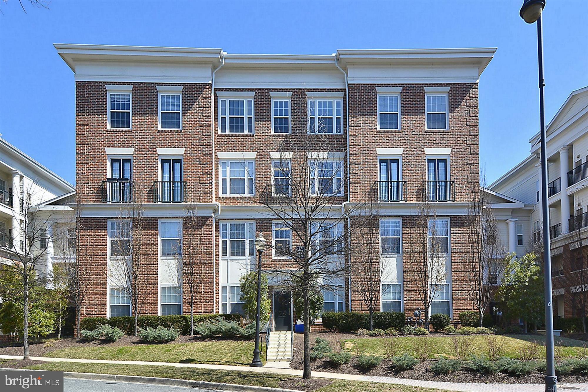 23 Arch Place, Unit 273 Gaithersburg, MD 20878 - Photo 52 of 103 a front view of a brick building