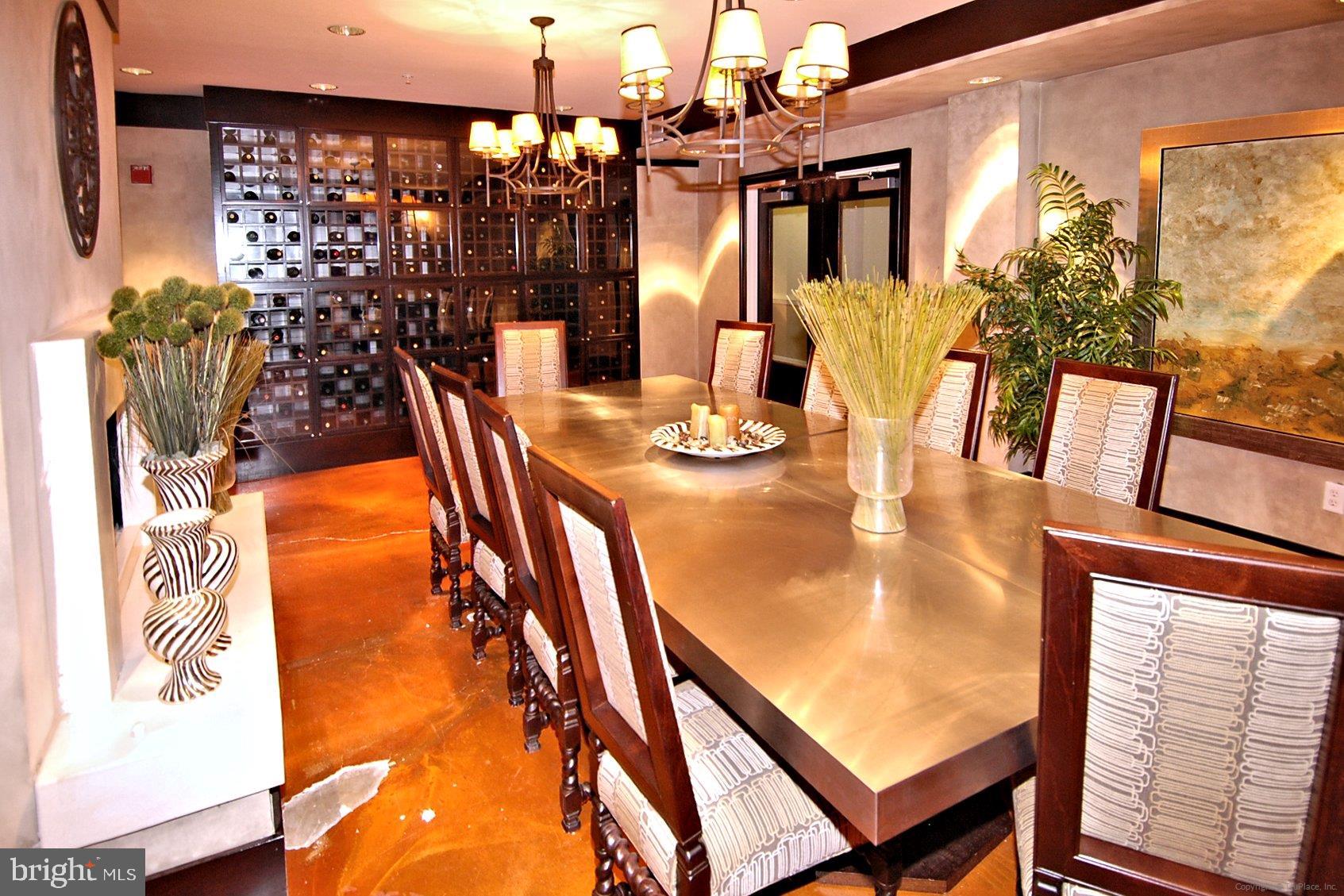 23 Arch Place, Unit 273 Gaithersburg, MD 20878 - Photo 65 of 103 a view of a dining room with furniture and chandelier