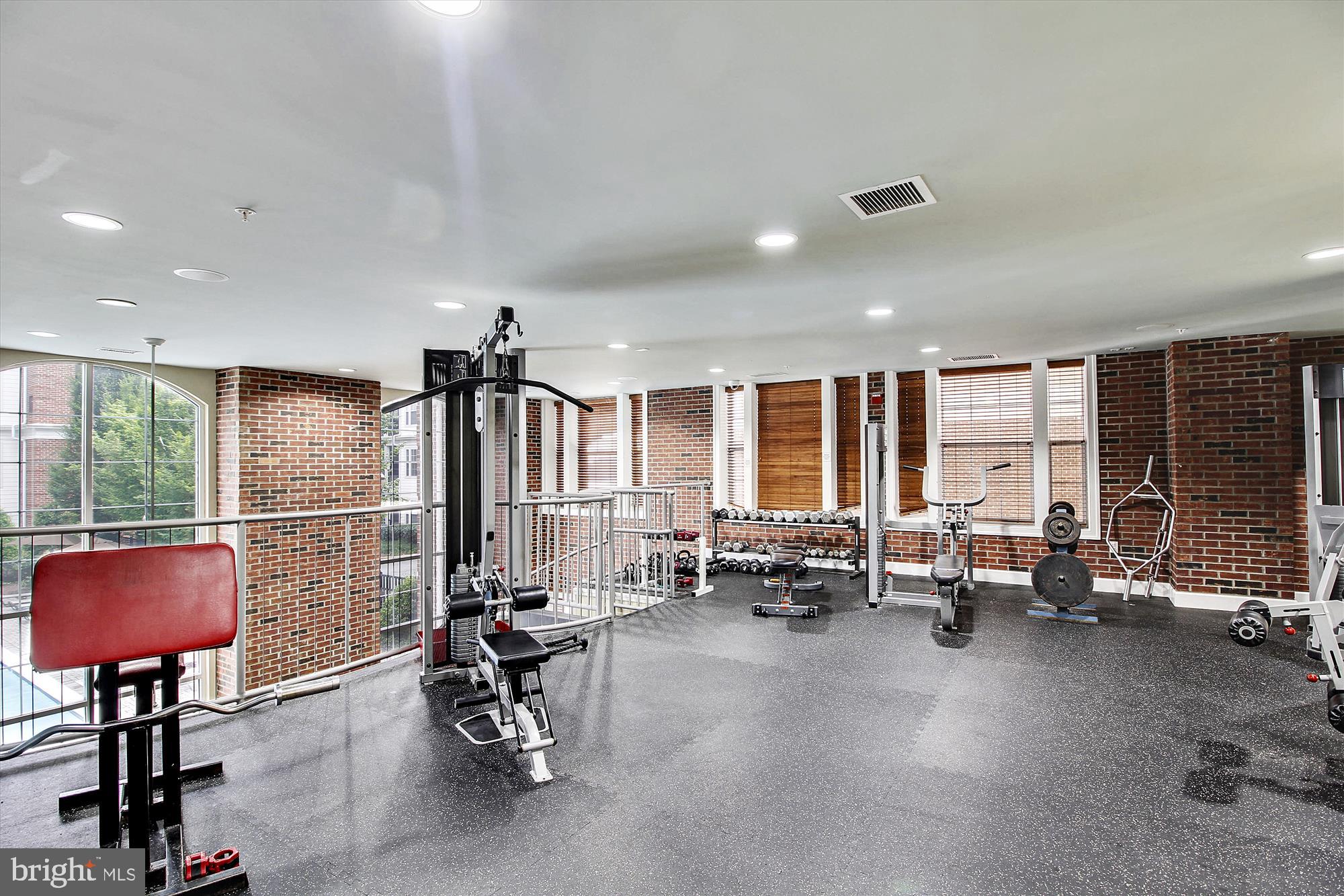 23 Arch Place, Unit 273 Gaithersburg, MD 20878 - Photo 68 of 103 a living room with furniture gym equipment and a large window
