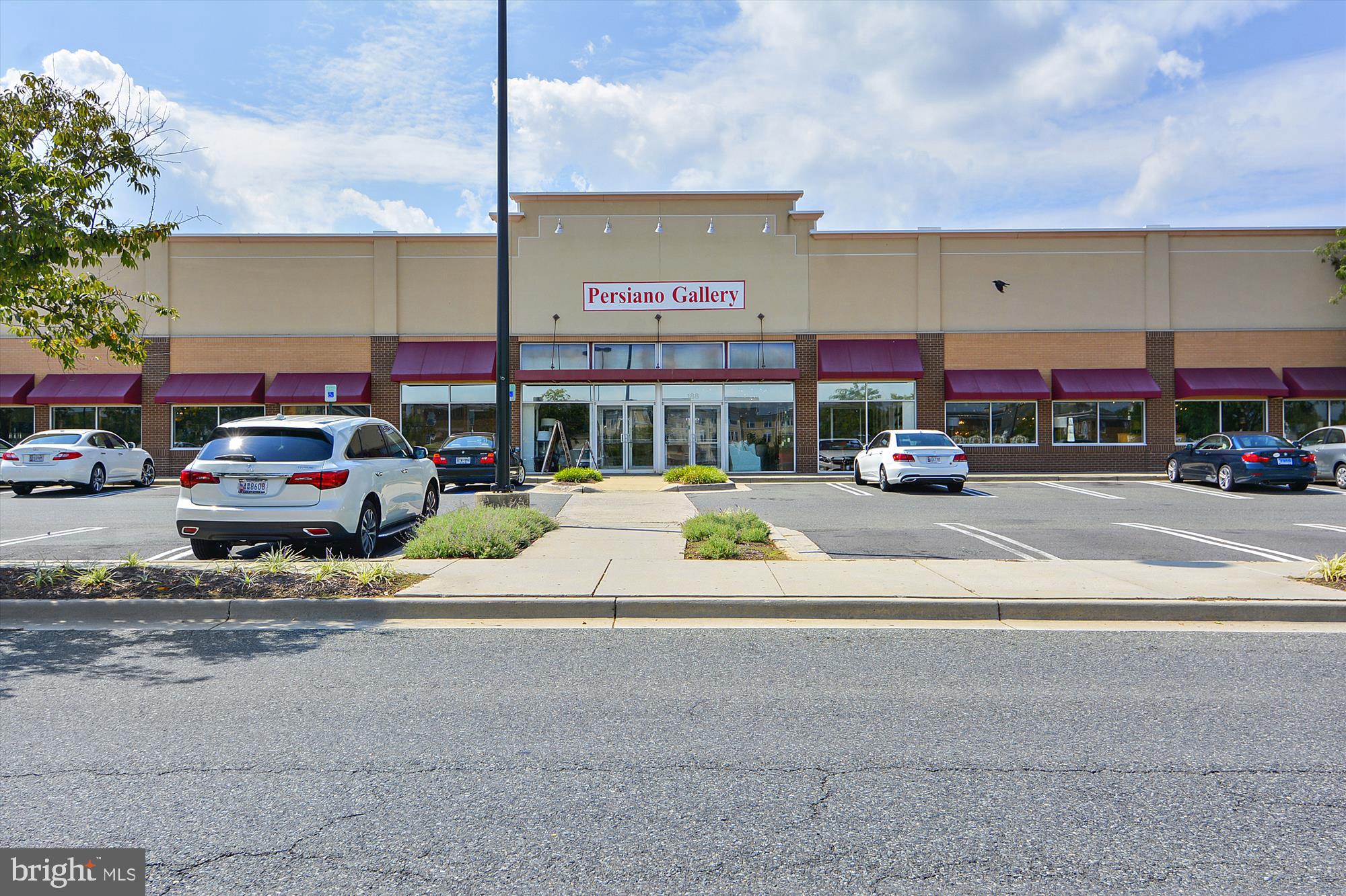 23 Arch Place, Unit 273 Gaithersburg, MD 20878 - Photo 77 of 103 a car parked in front of a building