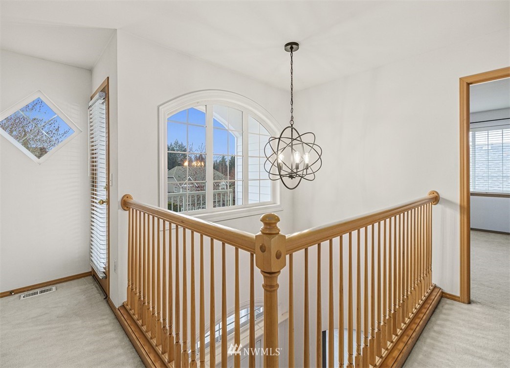 3518 Northeast 24th Court Renton, WA 98056 - Photo 12 of 17 a view of a hallway view with staircase