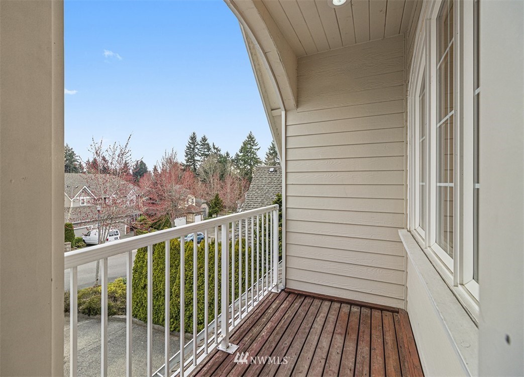 3518 Northeast 24th Court Renton, WA 98056 - Photo 16 of 17 a view of a balcony with wooden floor