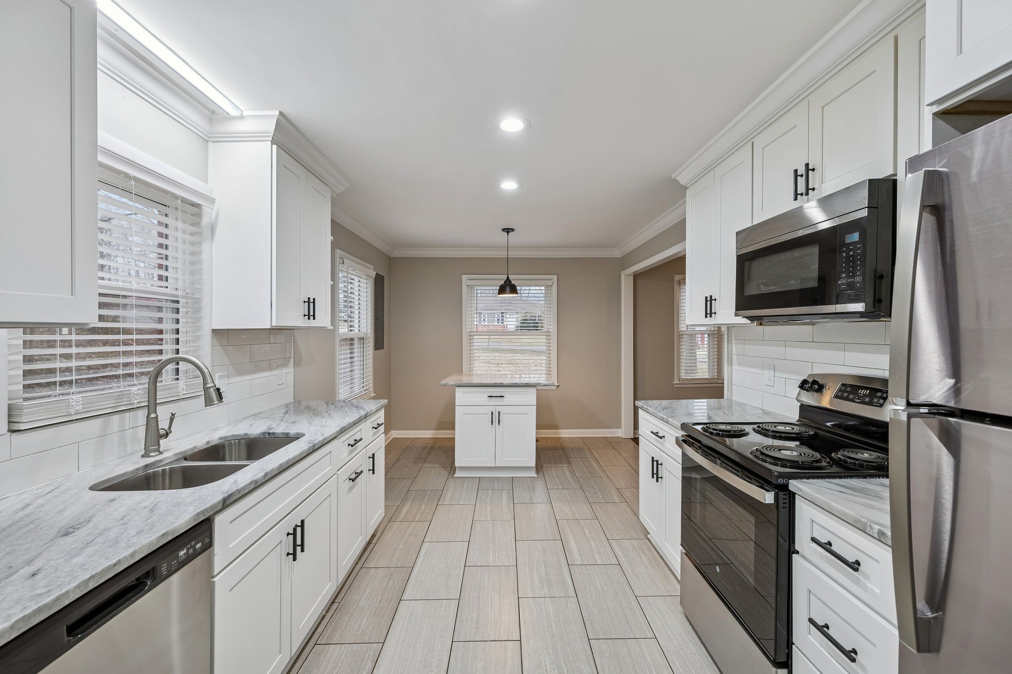 111 Chestnut Street Smyrna, TN 37167 - Photo 15 of 41 a kitchen with a sink stove top oven and refrigerator