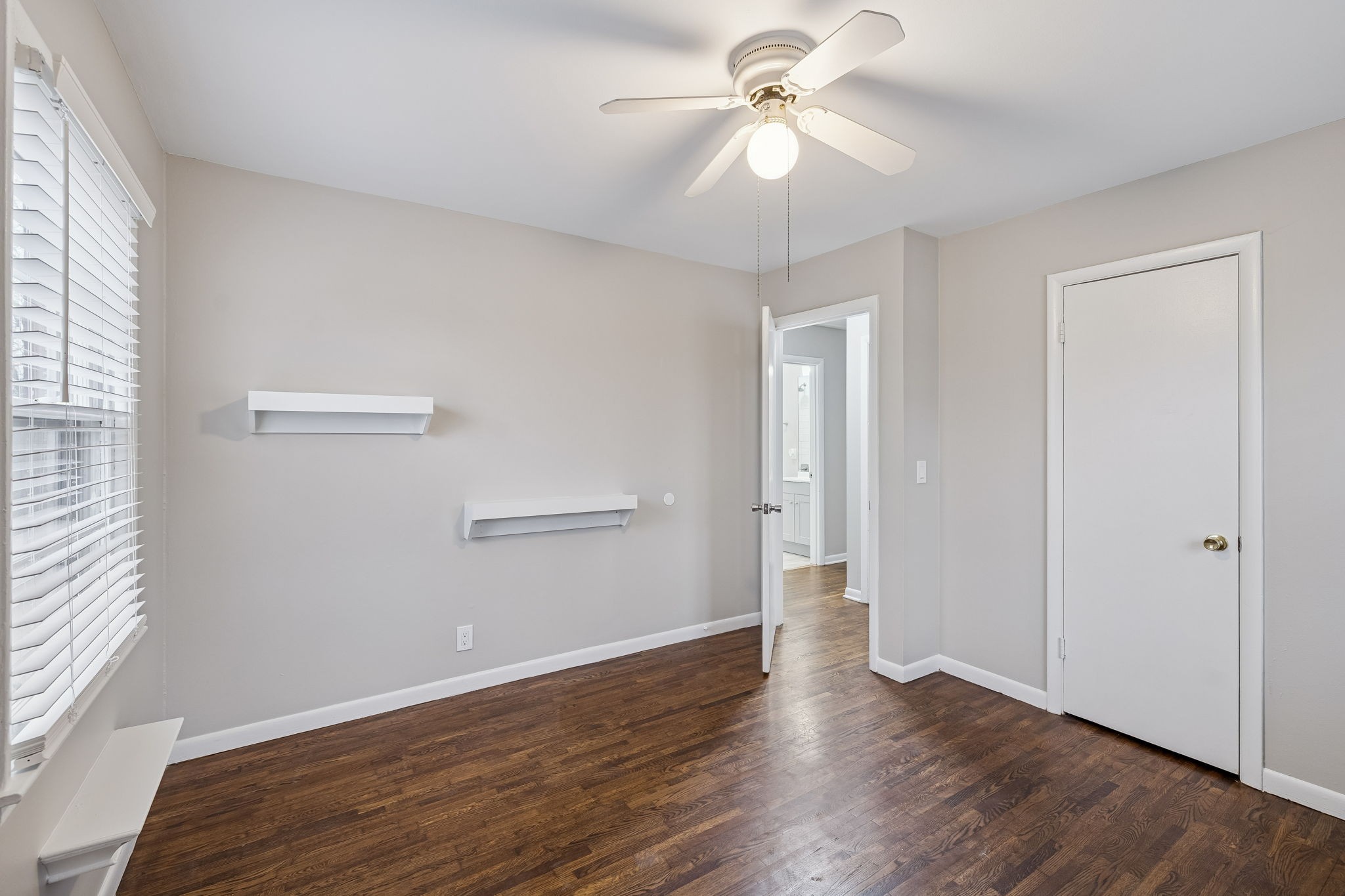 111 Chestnut Street Smyrna, TN 37167 - Photo 18 of 41 an empty room with wooden floor fan and windows