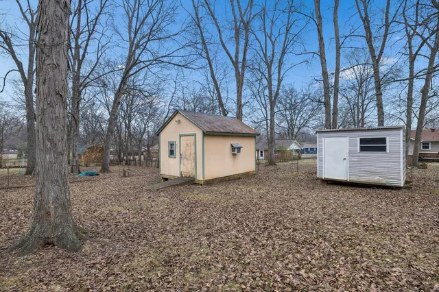 a house with trees in front of it