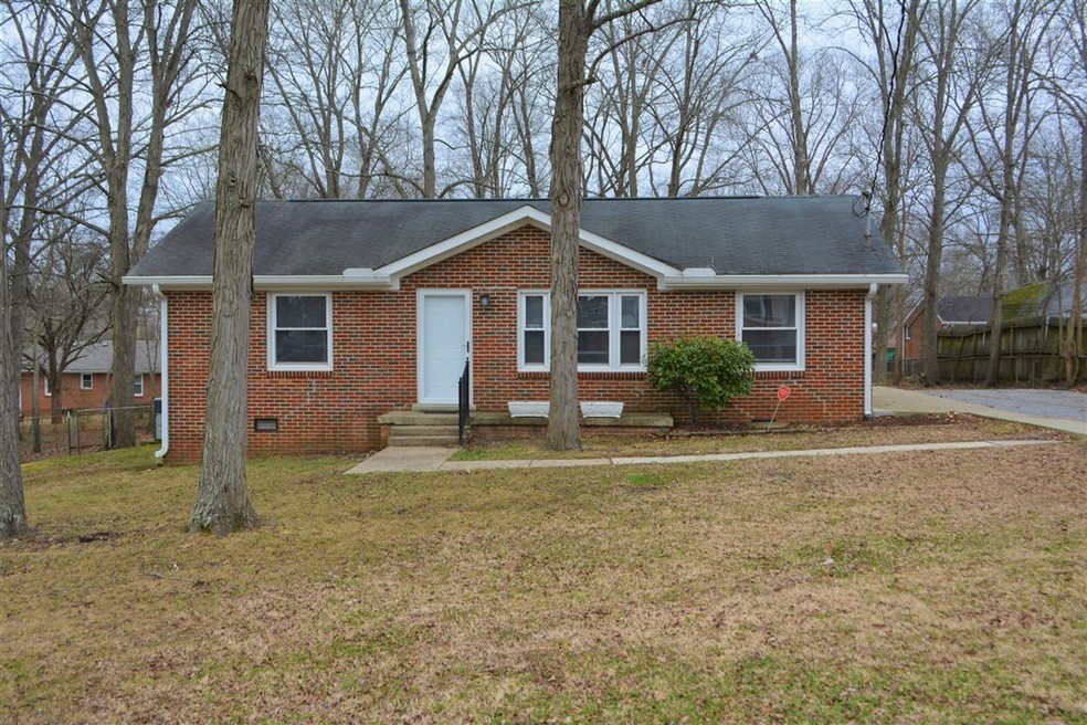 111 Chestnut Street Smyrna, TN 37167 - Photo 3 of 41 a front view of a house with a yard