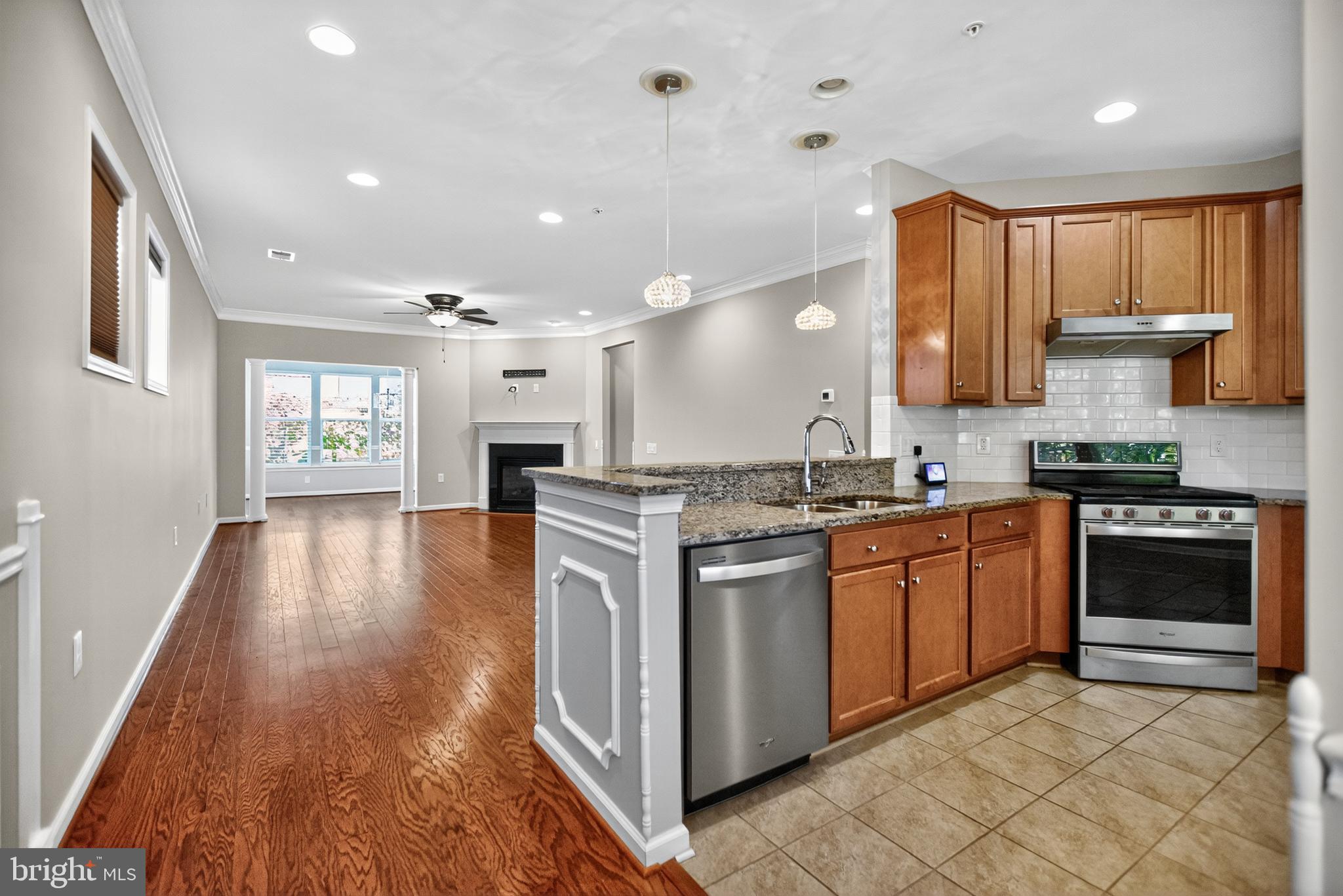 32 Montauk Avenue Fredericksburg, VA 22406 - Photo 15 of 30 a kitchen with stainless steel appliances granite countertop a stove top oven a sink dishwasher and a refrigerator