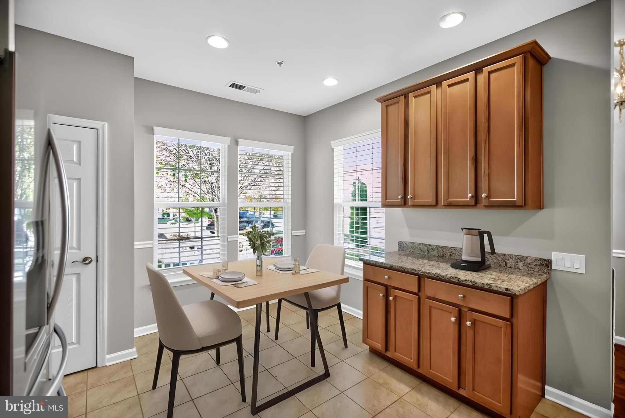 32 Montauk Avenue Fredericksburg, VA 22406 - Photo 17 of 30 a kitchen with stainless steel appliances granite countertop a stove a sink and a refrigerator