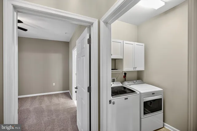 a bathroom with a sink a mirror a toilet and bathtub