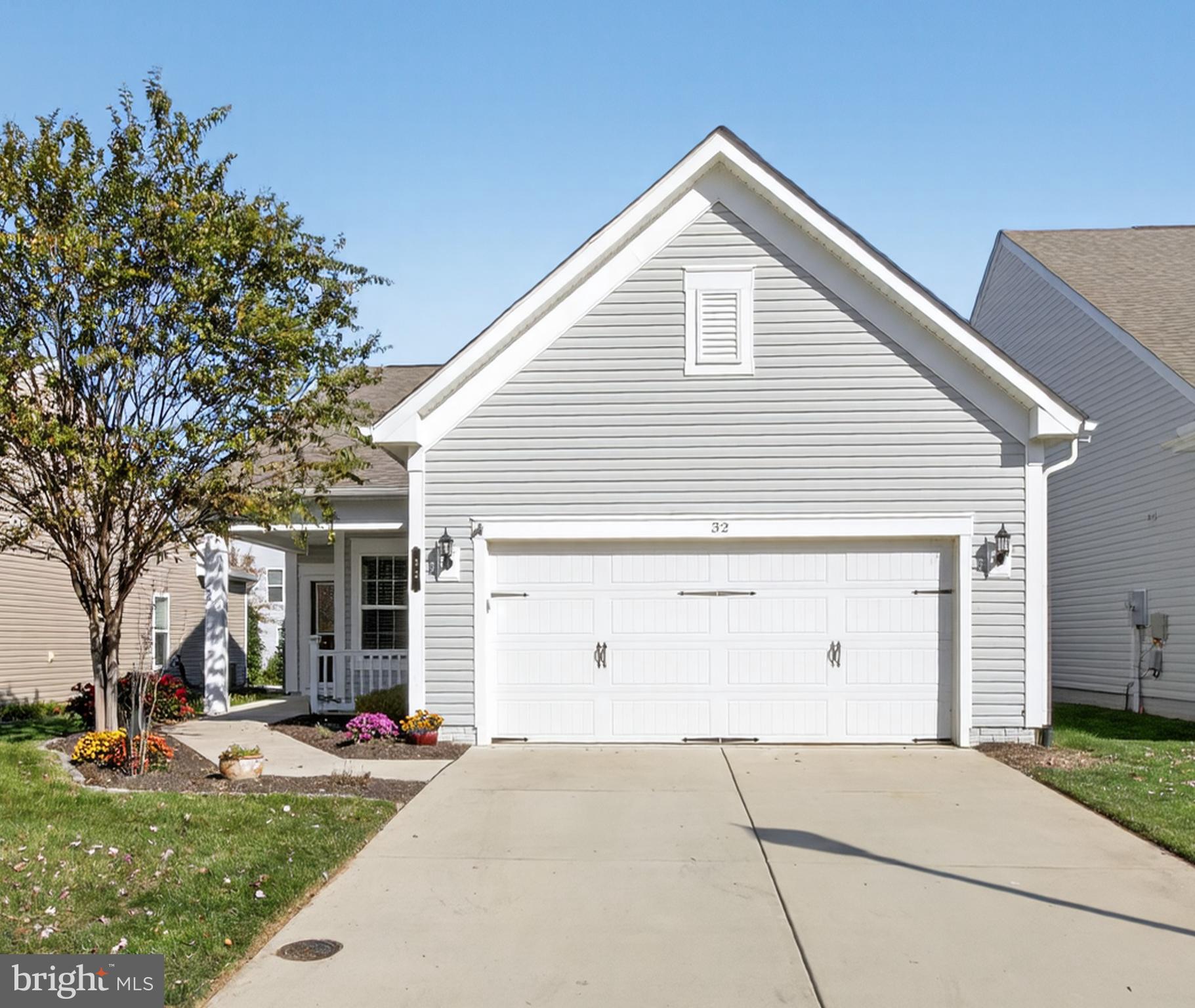 32 Montauk Avenue Fredericksburg, VA 22406 - Photo 29 of 30 a view of a white house with a yard and large tree