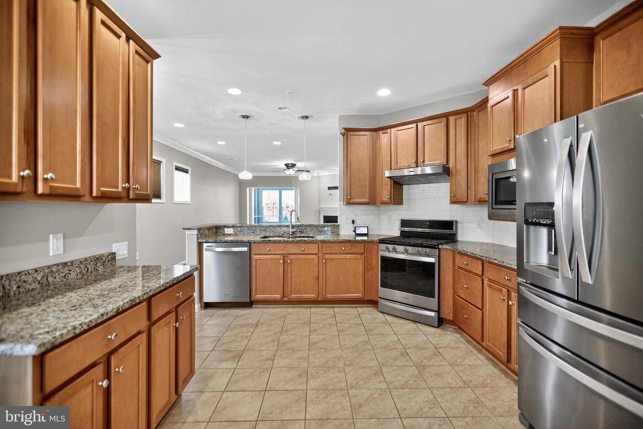 32 Montauk Avenue Fredericksburg, VA 22406 - Photo 5 of 30 a large kitchen with stainless steel appliances granite countertop a stove a sink dishwasher and a refrigerator