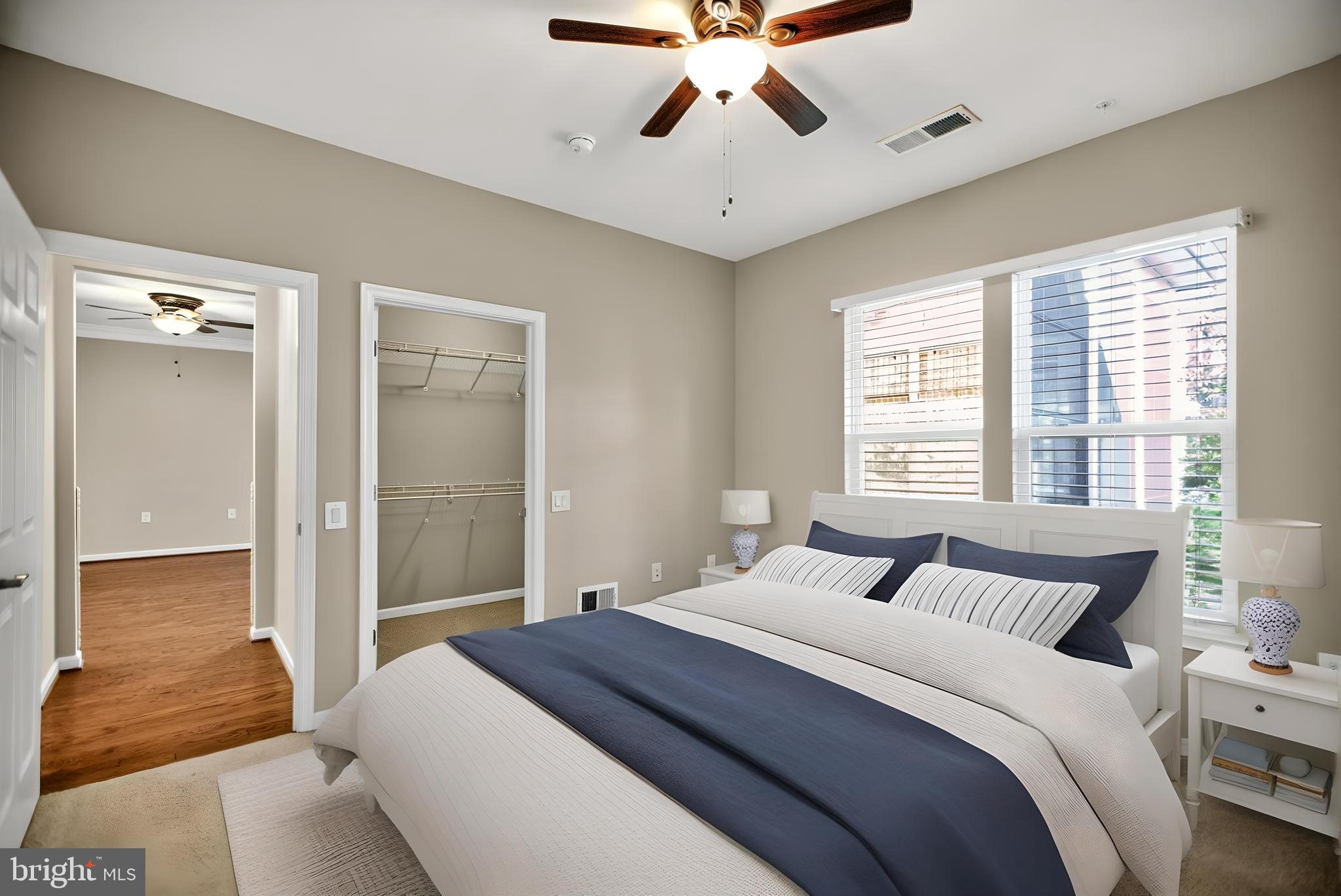 32 Montauk Avenue Fredericksburg, VA 22406 - Photo 10 of 30 a bedroom with a large bed and a chandelier