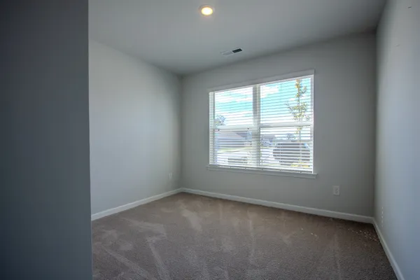 a kitchen with a sink a refrigerator a stove a microwave and dining table