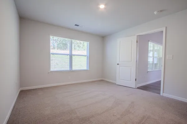 an empty room with windows
