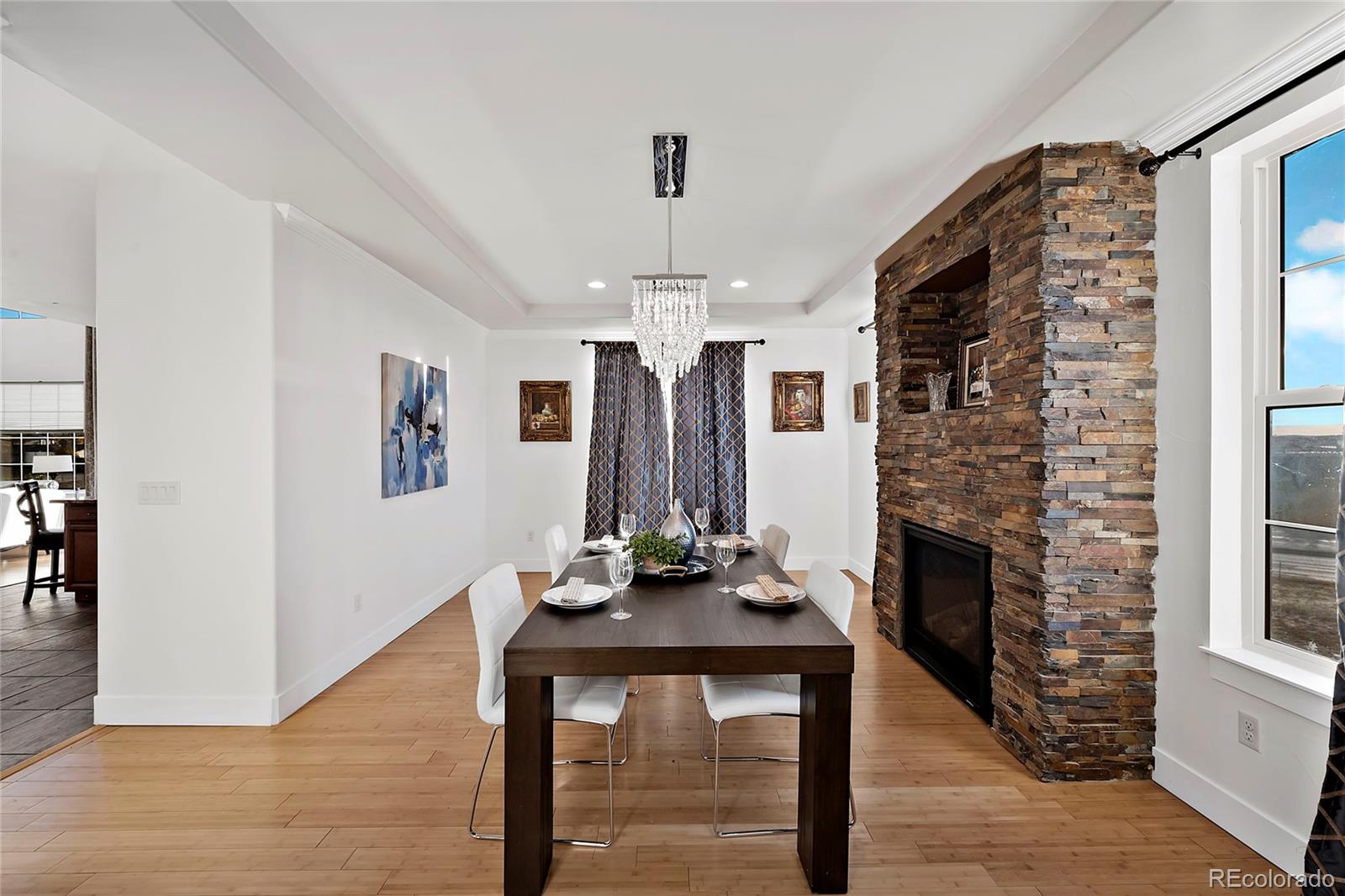 16520 East Easter Way Foxfield, CO 80016 - Photo 12 of 38 a view of a livingroom with furniture and window