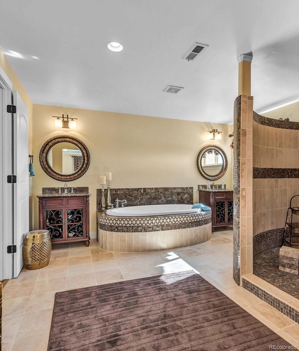 16520 East Easter Way Foxfield, CO 80016 - Photo 18 of 38 a view of living room with furniture and a fireplace