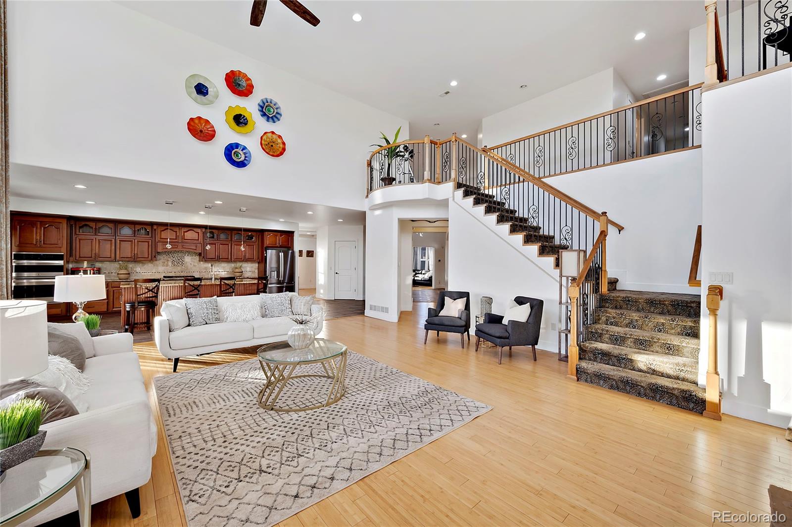 16520 East Easter Way Foxfield, CO 80016 - Photo 5 of 38 a living room with furniture and wooden floor