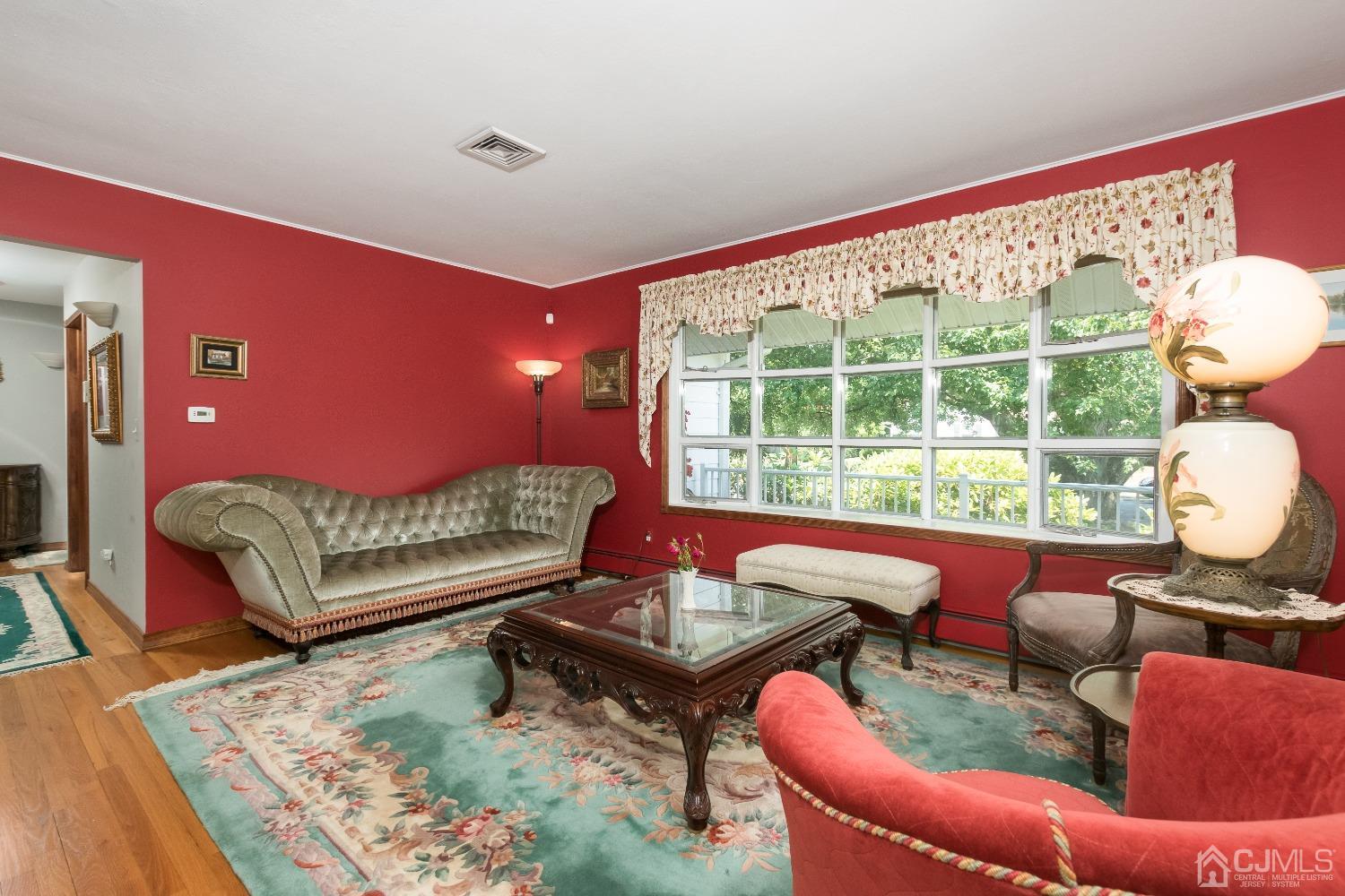1 Holmes Road Cranbury, NJ 08512 - Photo 6 of 39 a living room with furniture and a large window
