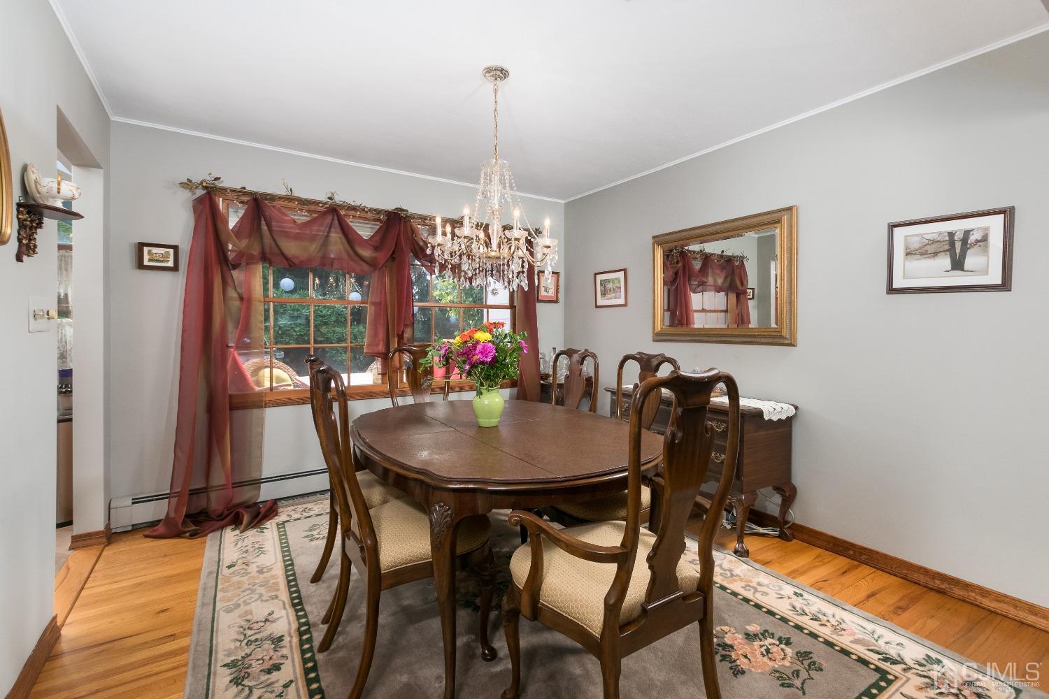 1 Holmes Road Cranbury, NJ 08512 - Photo 8 of 39 a view of a dining room with furniture window and outside view