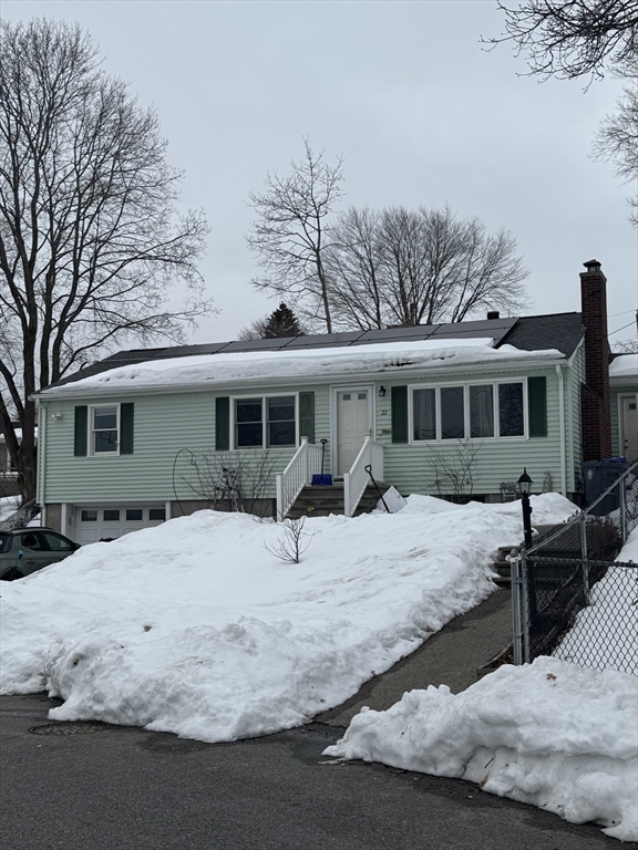 22 Falcon Street Methuen, MA 01844 - Photo 1 of 12 a front view of a house with yard patio and dinning area