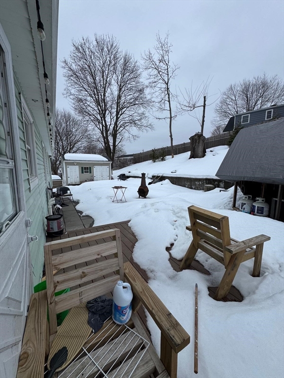 22 Falcon Street Methuen, MA 01844 - Photo 11 of 12 a view of a backyard with sitting area
