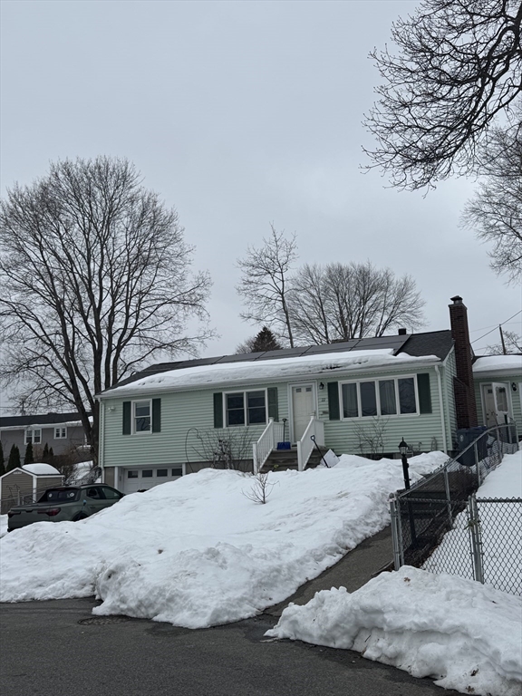 22 Falcon Street Methuen, MA 01844 - Photo 12 of 12 a front view of a house with a yard