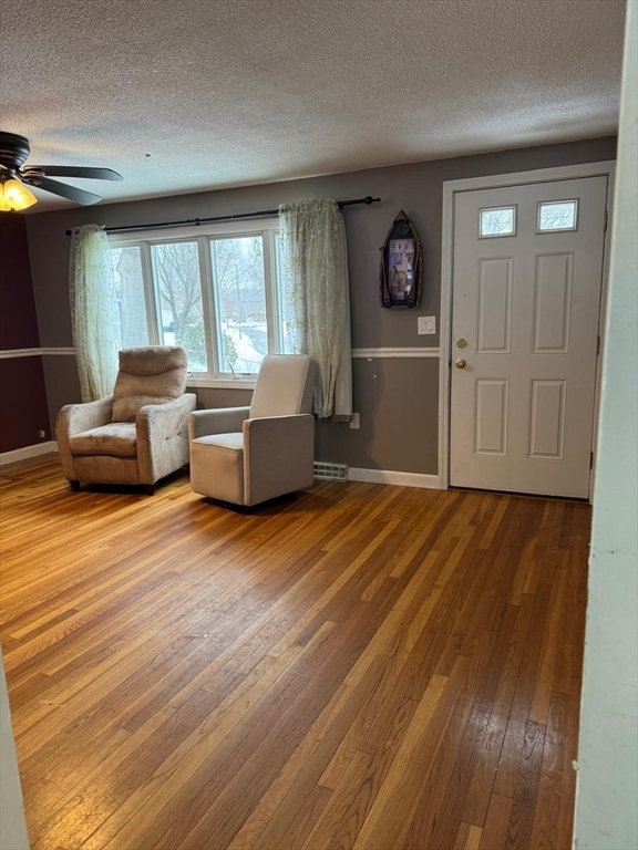 22 Falcon Street Methuen, MA 01844 - Photo 3 of 12 a living room with furniture and large windows