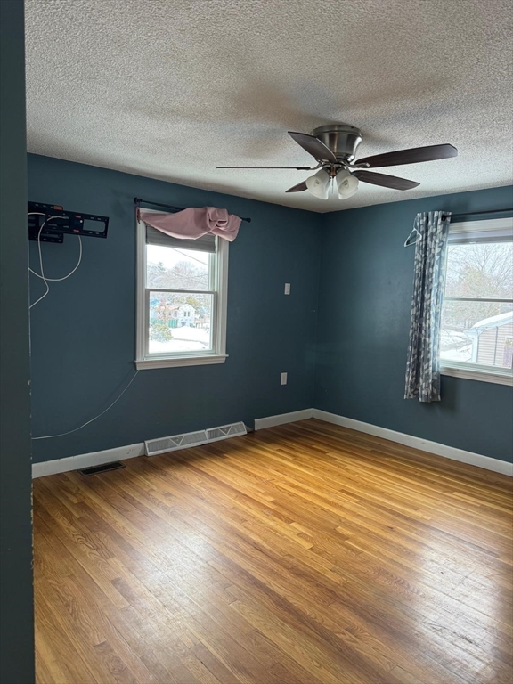 22 Falcon Street Methuen, MA 01844 - Photo 4 of 12 a view of an empty room with a window