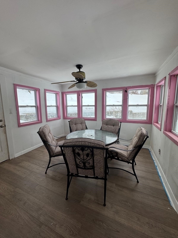 22 Falcon Street Methuen, MA 01844 - Photo 10 of 12 a view of a dining room with furniture a livingroom and wooden floor