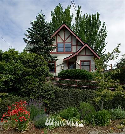 3934 Southwest Southern Street Seattle, WA 98136 - Photo 1 of 1 a view of house with tall trees