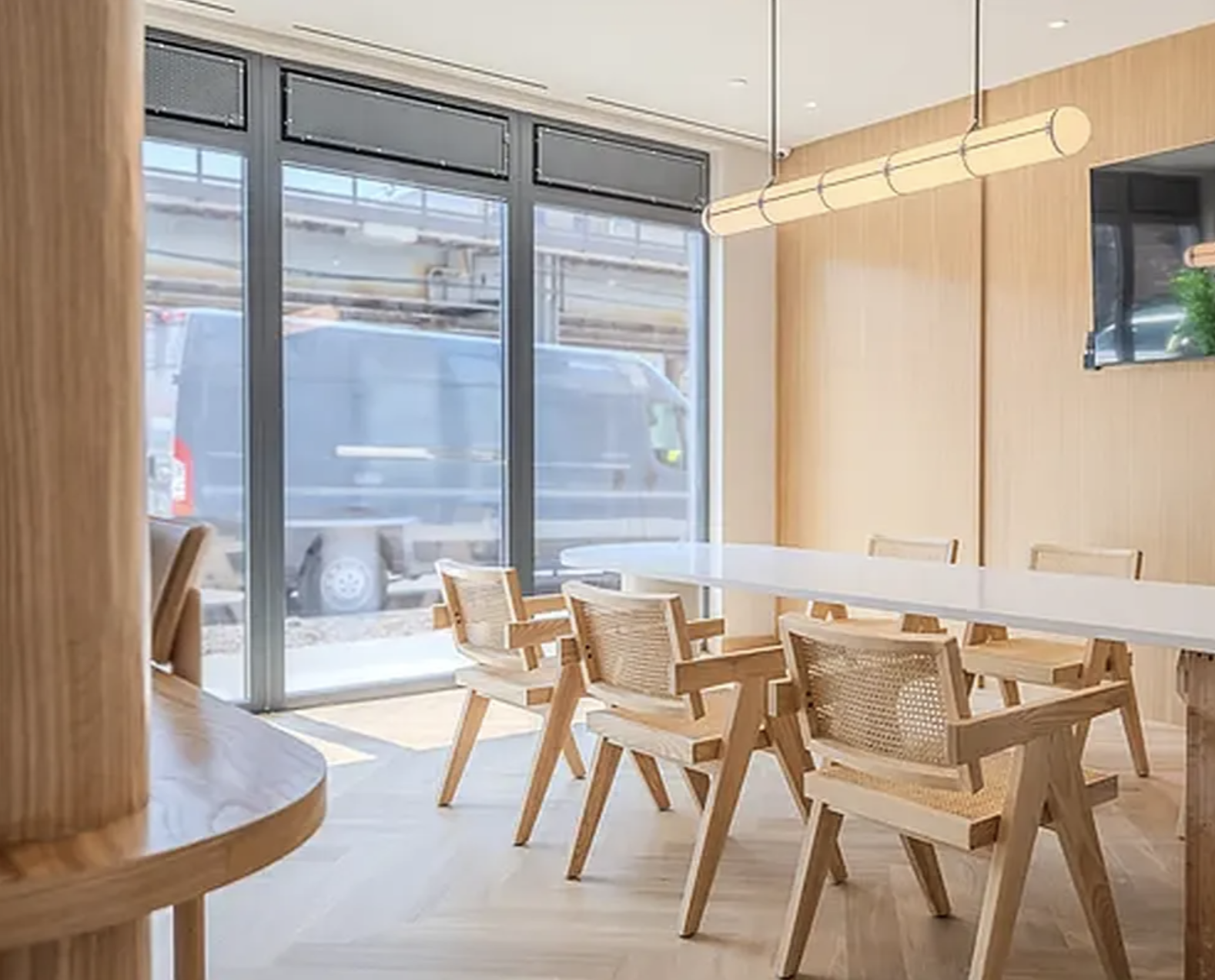 1889 Atlantic Avenue, Unit 9E Brooklyn, NY 11233 - Photo 7 of 9 a dining room with furniture and a window