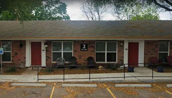 a front view of a house with garage