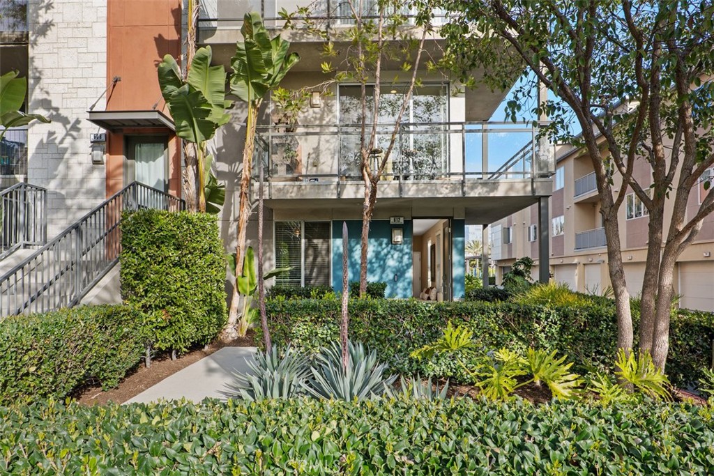 612 Rockefeller Irvine, CA 92612 - Photo 2 of 12 front view of a house with a small yard