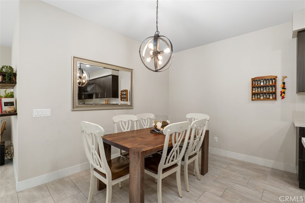 612 Rockefeller Irvine, CA 92612 - Photo 6 of 12 a dining room with furniture window and wooden floor