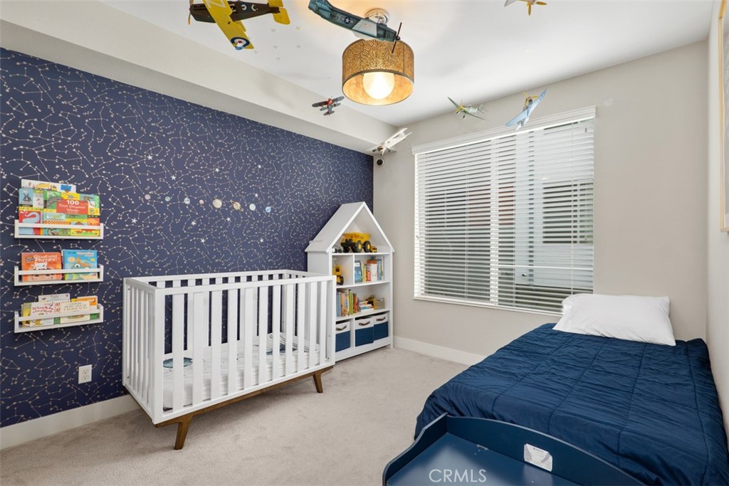 612 Rockefeller Irvine, CA 92612 - Photo 10 of 12 a bedroom with furniture and a window