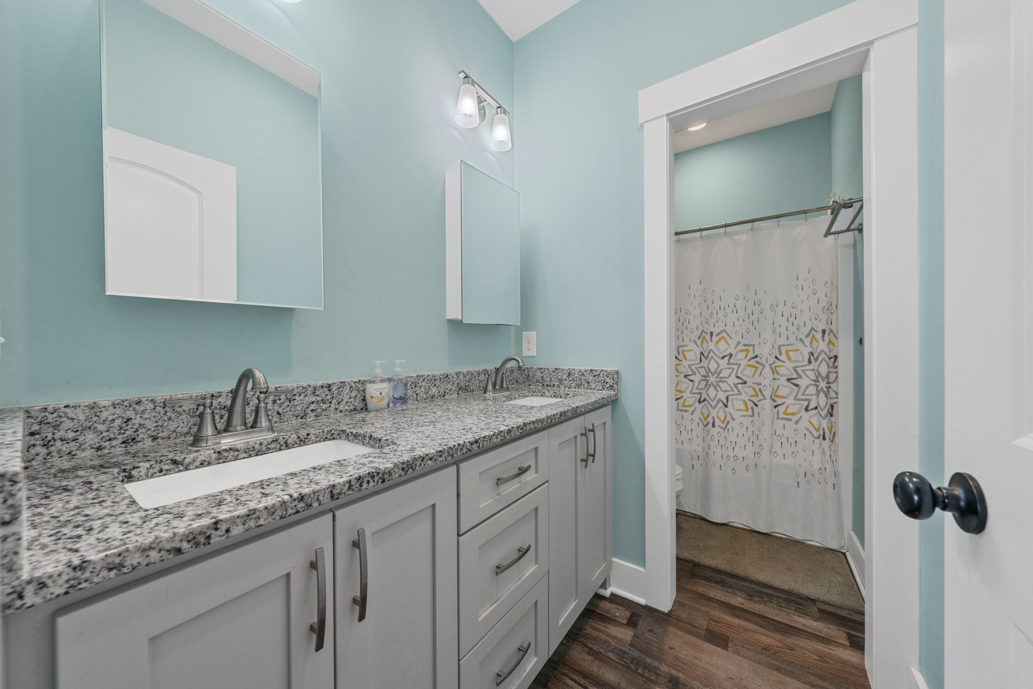 2086 Beverly Court Springfield, TN 37172 - Photo 25 of 39 a bathroom with a granite countertop sink and a mirror