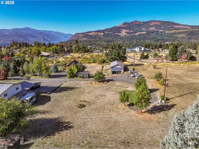 a view of a lake with mountains in the background