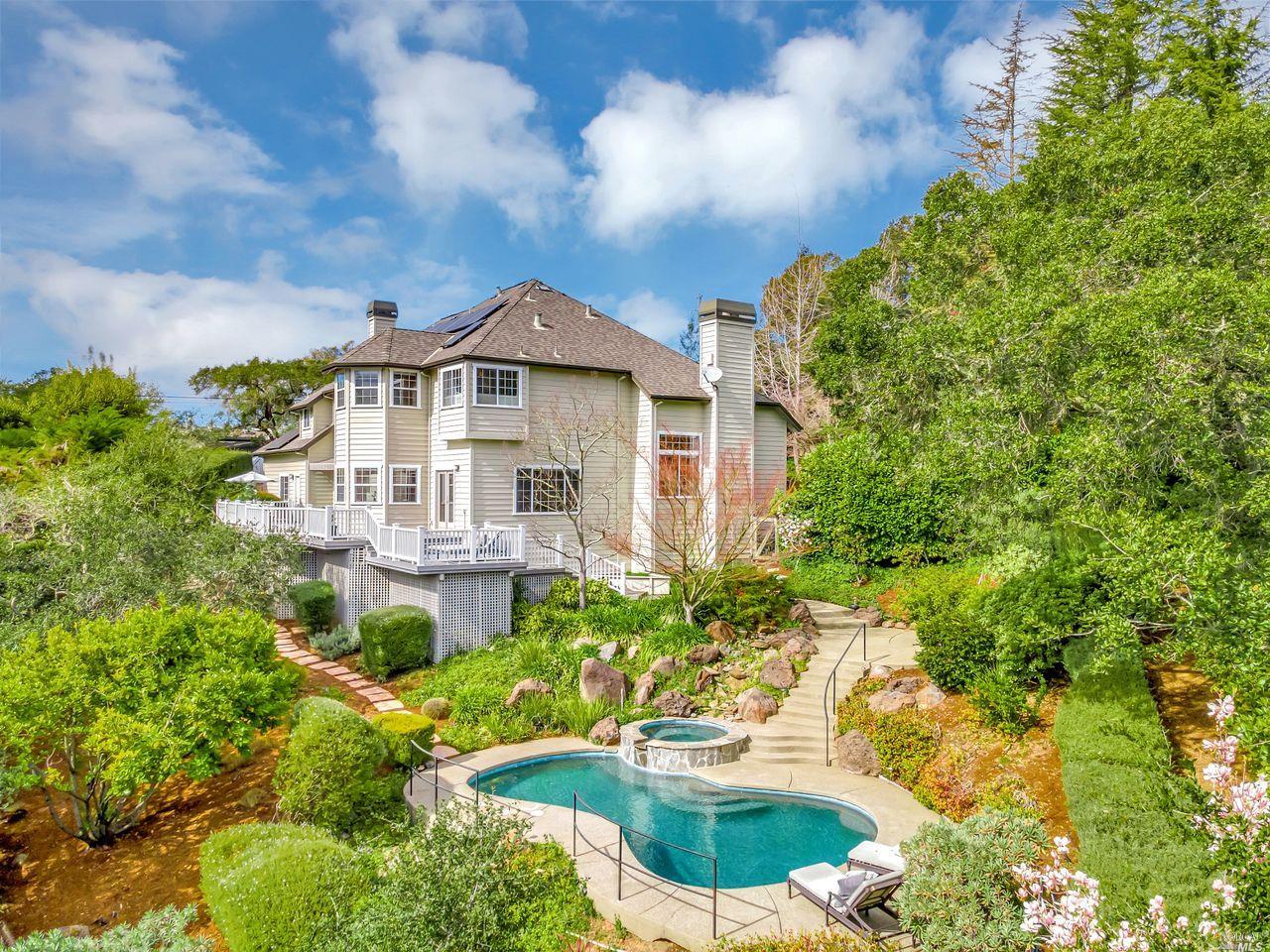 1834 Happy Valley Road Santa Rosa, CA 95404 - Photo 1 of 1 a front view of a house with a yard and fountain in middle