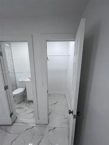 a bathroom with a sink and toilet